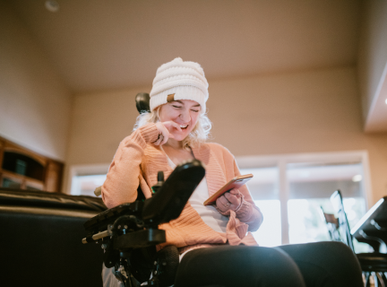 videographer smiling at a pleasant mobile experience 